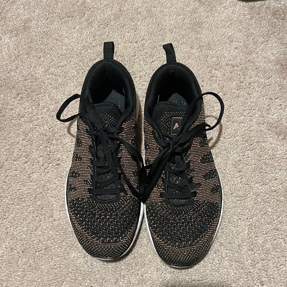 APL bronze and black sneakers